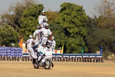 Indian Army performing Synchronised balancing act on motor cycles at Jabalpur Madhya Pradesh India Asia  clipart