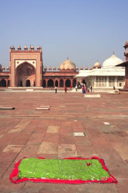 Tomb of Shaikh Salim Chishti made from white marble in Jami mosque's courtyard in Fatehpur Sikri built during second half of 16th century , capital of Mughal empire , Agra, Uttar Pradesh , India UNESCO World Heritage Site clipart