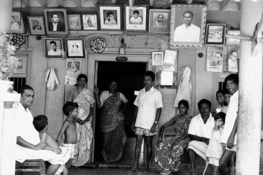 Family and ancestor photo frames Versova Mumbai Maharashtra India Asia 1977  clipart