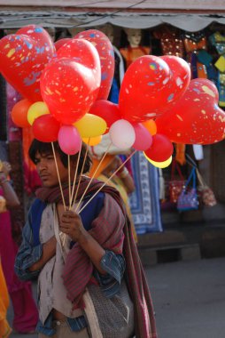 Balon satıcısı, Rajasthan, Hindistan 