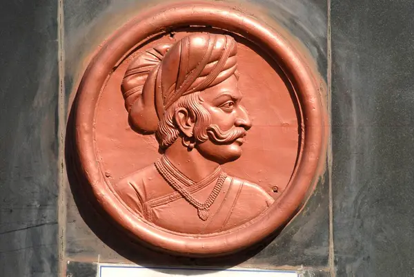 stock image Santajirao Ghorpade relief work in Bronze General of Maratha Army of King Sambhaji at Deccan, Pune, Maharashtra, India 