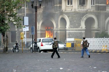 Smoke emits from Taj Mahal Hotel during terrorist attack ; Bombay Mumbai ; Maharashtra ; India 29-November-2008 clipart
