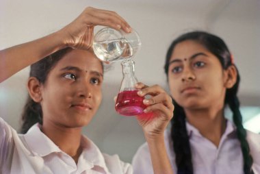 Students doing science experiment 