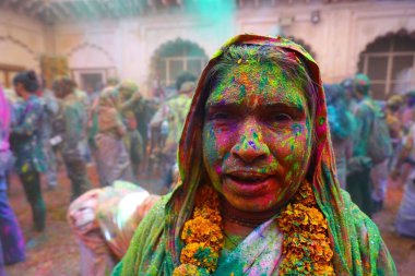 Widows celebrating Holi festival Gopinath temple, Uttar Pradesh, India, Asia  clipart