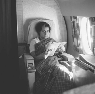 Ex prime minister Mrs. Indira Gandhi in 1960 On flight to Allahabad, India    clipart