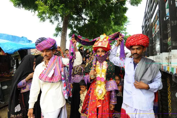 stock image Rural marriage procession in child marriage, Mindiyada near Anjaar, Kutch, Gujarat, India   