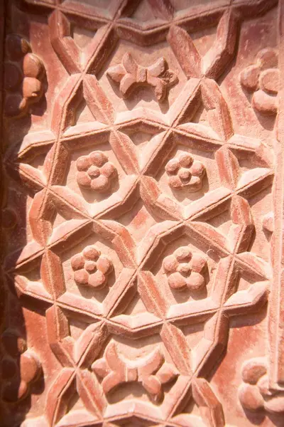 stock image Detail of the ornamental floral design of the Rumi Sultana the Turkish Queens house near Khwabgah, red stone Mughal architecture, Fatehpur Sikiri, Uttar Pradesh, India.