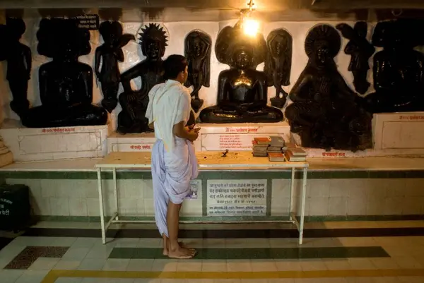 stock image Priest standing in Gajadhwaja Hillock temple, Chamar Leni, Nashik, Maharashtra, India 