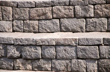 Pattern of stone steps of Ambalpadi temple near Udipi, Karnataka, India clipart