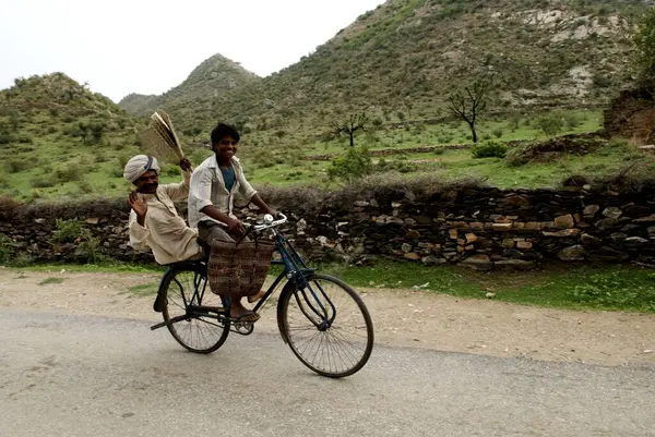 Stock image Man riding cycle, Dilwara town, Rajasthan, India 