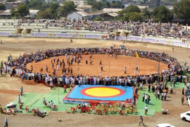 Friendly kabaddi match between India and Pakistan held for celebrations of 300th year of consecration of perpetual Guru Granth Sahib, Khalsa sports ground in Nanded, Maharashtra, India  clipart