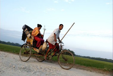 Çekçekli adam, Bongaigaon, Assam, Hindistan 