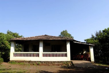 Village House with Mangalore tile roofing mostly used as guest house ; Dahagaon ; Kalyan ; Distract Thane ; Maharashtra ; India clipart