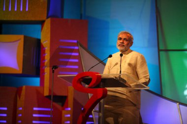 Narendra Modi. chief minister of Gujarat addressing large gathering of businessmen at CNBC TV18 Indian Business Leader Award. Bombay Mumbai. Maharashtra. India    clipart