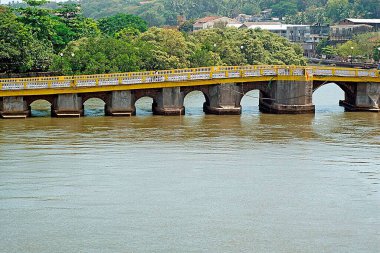 Pato bridge on creek at Mandovi river , Goa , India clipart