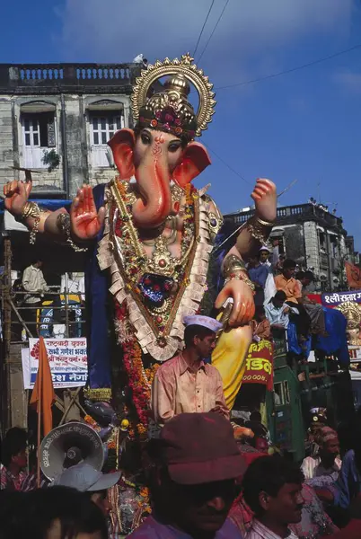 stock image idol of lord ganesh (elephant headed god)  ;  Ganesh ganpati Festival ; mumbai bombay ; maharashtra ; india