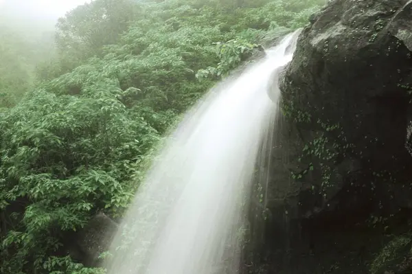 stock image Movement blur of water at Malshej ghat waterfall near Bombay Mumbai Maharashtra ; India