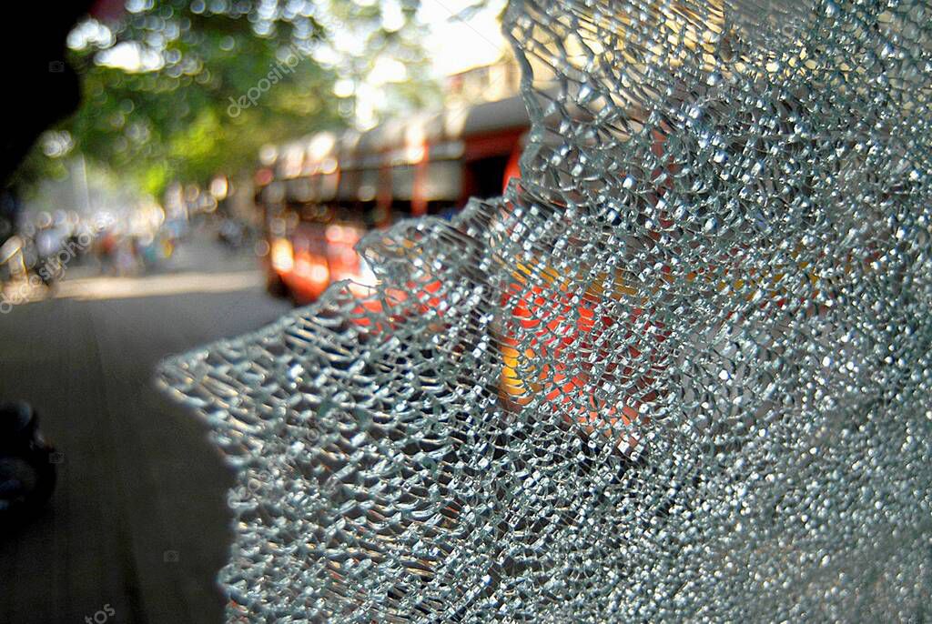 MNS Maharashtra Navnirman Sena activists broken glass at toll naka at Mulund ; Bombay Mumbai ; Maharashtra ; India
