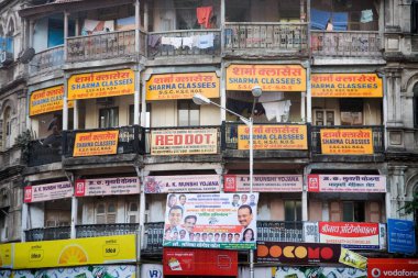 Hoardings on residential building, Girgaon, Bombay Mumbai, Maharashtra, India  clipart