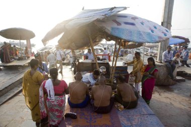 Pitru paksha puja ganga ghat varanasi uttar pradesh India Asia  clipart