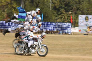 Indian Army performing Synchronised balancing act on motorcycles at Jabalpur Madhya Pradesh India Asia  clipart
