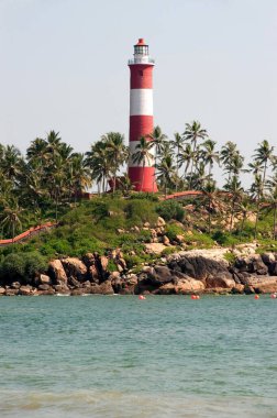 Lighthouse at kovalam beach ; Trivandrum Thiruvananthapuram ; Kerala ; India 2010 clipart