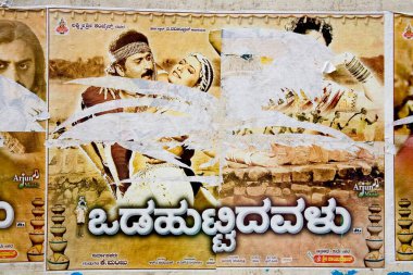 Wall poster of the Kannada Language film , M G Road , Banglore , Karnatak , India clipart