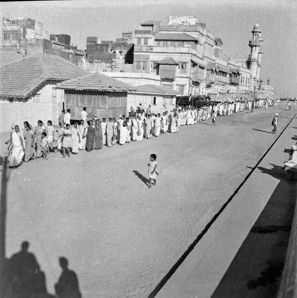 stock image old vintage 1900s black and white picture of Indian people queue homage after Mahatma Gandhi assasination India 1948   