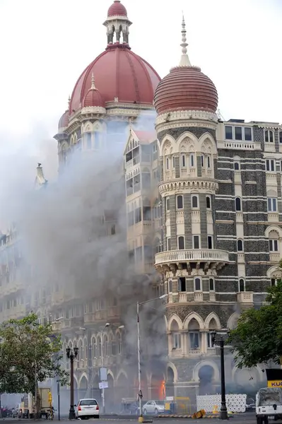stock image Fire inside the Taj Mahal hotel ; after terrorist attack by Deccan Mujahideen on 26th November 2008 in Bombay Mumbai ; Maharashtra ; India