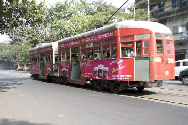 stock image Red tram old way of commuting service ; Calcutta now Kolkata ; West Bengal ; India