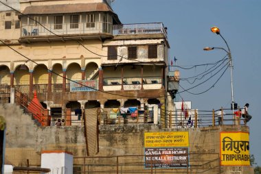 Building with glowing street lamps ; Varanasi ; Uttar Pradesh ; India clipart