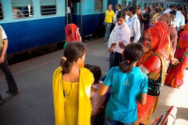 Commuters waiting to get into local train on platform of Borivali station ; Bombay Mumbai ; Maharashtra ; India clipart