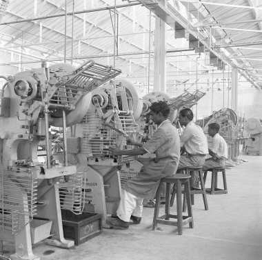 Workers at the assembly line, telephone factory, manufacturing of telephone instruments at Bangalore, Karnataka, India, year 1950    clipart