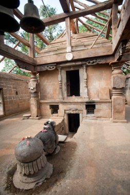 Renovating of old someshwar temple at Rajwadi, Sangmeshwar, Ratnagiri, Maharashtra, India  clipart