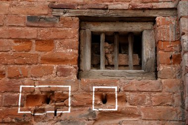 Bullet marks visible on preserved wall at Jallianwala or Jalianwala Bagh ; Amritsar ; Punjab ; India clipart