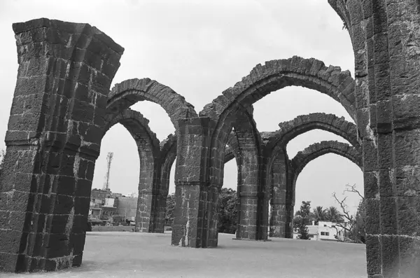 stock image Bara kaman unfinished arches of mausoleum of Adil Shah second 6th century archaeological monument, Bijapur, Karnataka, India.