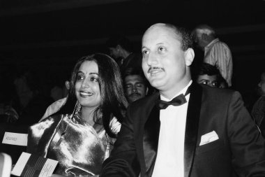 Indian old vintage 1980s black and white bollywood cinema hindi movie film actor, India, Anupam Kher, Indian actor, Kiran Kher wife  clipart
