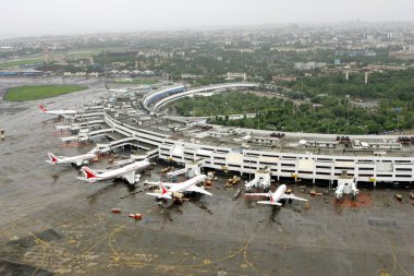 An aerial view of Air India aircrafts parked and runways at airport of Mumbais Chhatrapati Shivaji Maharaj International at Sahar ; Bombay Mumbai ; Maharashtra ; India  clipart