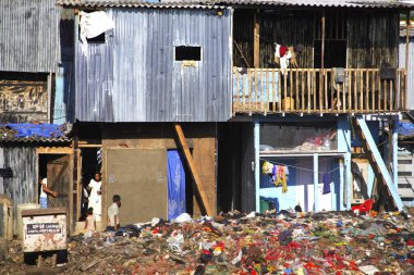 Debris at slum ; Behram Naupada ; Anant Kanekar Marg ; Bandra ; Bombay Mumbai ; Maharashtra ; India 17-September-2009 clipart