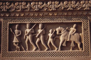 Carving - panel on Hindu temple - Maheshwar , Madhya Pradesh, India  clipart