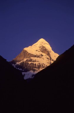 Neelkanth peaks in morning ; badrinath ; uttaranchal ; india clipart