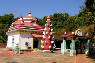 Shri Dasabhuj Lakshmi Ganesh temple with colorful lamppost ; Deepmal at Hedvi ; Konkan region ; Taluka Guhagar ; District Ratnagiri ; Maharashtra ; India clipart