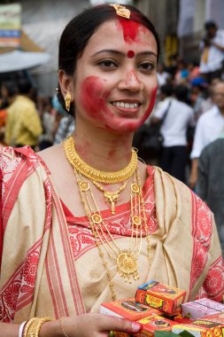 woman celebrating Durga Pooja dussera Vijayadasami Navaratri Festival, Calcutta Kolkata, West Bengal, India   clipart