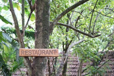 Restaurant sign, Kurumba Village Resort, Hillgrove, Karamadai, Burliyar, Nilgiris, Tamil Nadu, India clipart