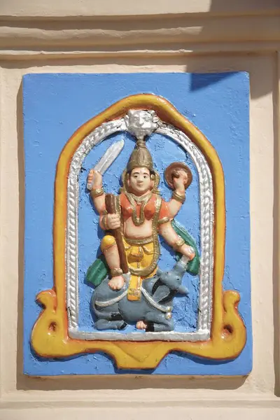 stock image Colourful image of the Goddess on the side of the Lamp Tower , Deepmandapam , Shri Mangeshi Temple complex , Priol , Ponda , Goa , India