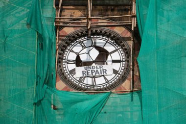 Repair works of the clock Chattrapati Shivaji Terminus Mumbai Maharashtra India Asia clipart