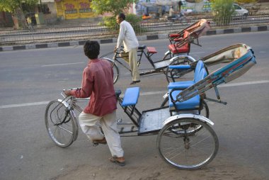 Cycle rickshaws with rider street scene, Jaipur, Rajasthan, India 