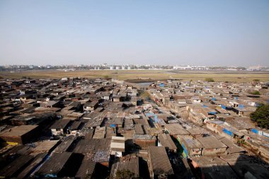 Slums around the Chhatrapati Shivaji International Airport or Sahar International Airport, Bombay Mumbai, Maharashtra, India  clipart
