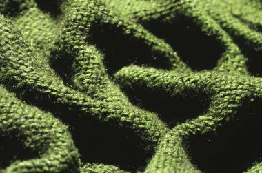 arkaplan olarak yeşil yün kumaş