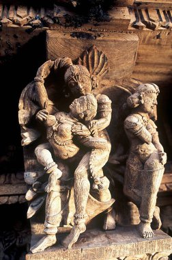 Nayak king love wooden carving statues in old temple chariot at Madurai, Tamil Nadu, India  clipart